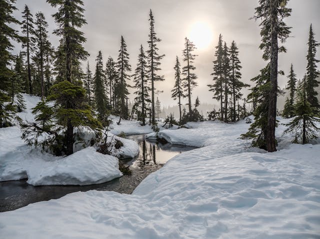 Mountain Sunrise Over Snow-Capped Peaks